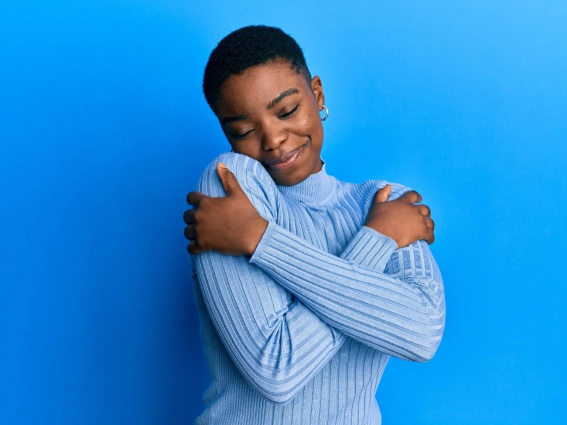 Woman Hugging Herself Woman Hugging Herself